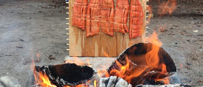 Campfire cooking salmon